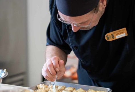 chef michel prepares a delicious meal at recovery cafe Terre Haute